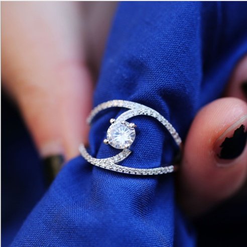 Radiant Zircon Curve Ring – Elegant Sparkle